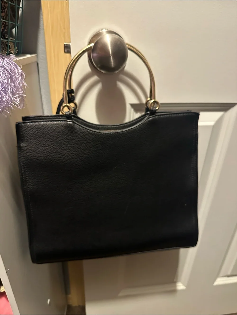 bebe Black Handbag with White & Black Tassels